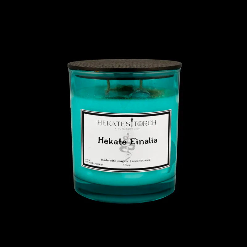 Teal candle with a label on a white background