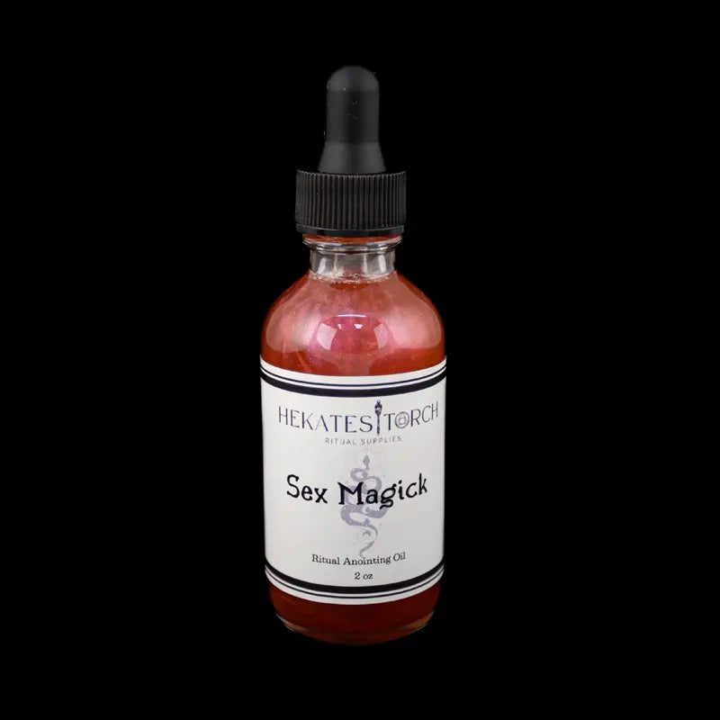 Sex Magic Ritual Oil bottle on black background