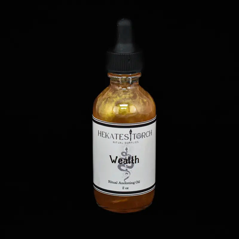 Bottle of Hekates Torch Wealth oil on a black background